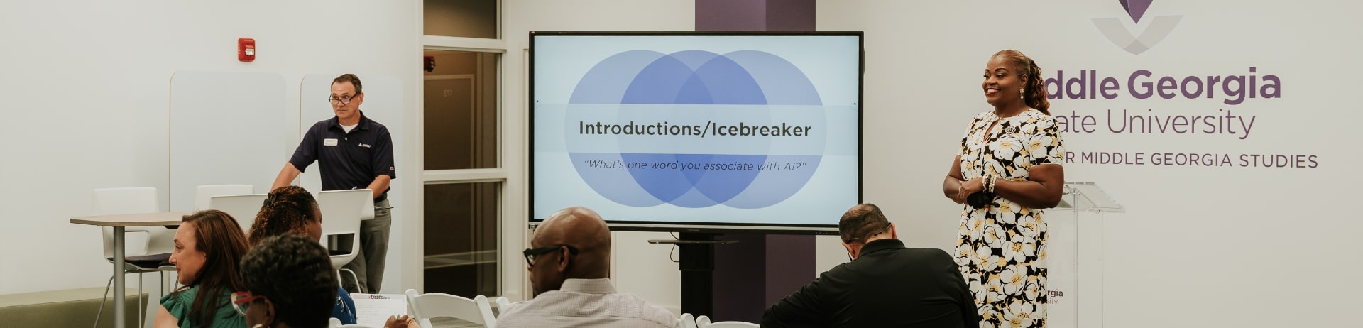 Dr. Kristie Roberts-Lewis and Dr. Rod McRae Present "Introductions/Icebreaker: What's one word you associate with AI" during AI for Impact workshop for nonprofits